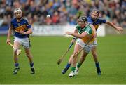 12 July 2014; Shane Dooley, Offaly, in action against Paddy Stapleton, right, and Brendan Maher, left, Tipperary. GAA Hurling All-Ireland Senior Championship Round 2, Tipperary v Offaly, O'Moore Park, Portlaoise, Co. Laois. Picture credit: Piaras Ó Mídheach / SPORTSFILE