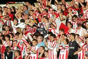 24 August 2006; Derry City supporters cheer on their team. UEFA Cup, Second Qualifying Round, Second Leg, Derry City v Gretna, Brandywell, Derry. Picture credit: Oliver McVeigh / SPORTSFILE