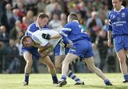 27 August 2006; Martin Harney, Ballinderry, in action against Manus Mc Shane and Louis McPeake, Bellaghy. The Elk Derry Senior Football Championship Quarter Final, Bellaghy v Ballinderry, Ballinascreen, Co. Derry. Picture credit: Oliver McVeigh / SPORTSFILE