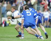 27 August 2006; Raymond Wilkson, Ballinderry, in action against Michael McGoldrick and Louis McPeake, Bellaghy. The Elk Derry Senior Football Championship Quarter Final, Bellaghy v Ballinderry, Ballinascreen, Co. Derry. Picture credit: Oliver McVeigh / SPORTSFILE