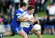 27 August 2006; Conleth Gilligan, Ballinderry, in action against Louis McPeake, Bellaghy. The Elk Derry Senior Football Championship Quarter Final, Bellaghy v Ballinderry, Ballinascreen, Co. Derry. Picture credit: Oliver McVeigh / SPORTSFILE