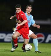 31 August 2006; Gary Liggett, Portadown, in action against Gary Haveron, Ballymena United. CIS Insurance Cup, Ballymena United v Portadown, Ballymena Showgrounds, Ballymena, Co. Antrim. Picture credit: Oliver McVeigh / SPORTSFILE
