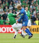 2 September 2006; Eidur Gudjohnson, Iceland, in action against Stephen Craigan, Northern Ireland. Euro 2008 Championship Qualifier, Northern Ireland v Iceland, Windsor Park, Belfast. Picture credit: Oliver McVeigh / SPORTSFILE