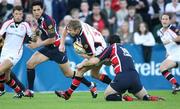 2 September 2006; Paul Steinmetz, Ulster, is tackled by Stephen Jones, Llanelli Scarlets. Magners League, Ulster v Llanelli Scarlets, Ravenhill Park, Belfast. Picture credit: Oliver McVeigh / SPORTSFILE