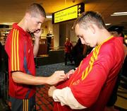 5 September 2006; Fernando Torres, Spain, signs autographs as he arrives at Belfast International airport prior to their Euro 2008 Championship Qualifier against Northern Ireland. Belfast International Airport, Belfast. Picture credit: Oliver McVeigh / SPORTSFILE