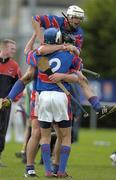 2 September 2006; Erin's Own players Stephen Cronin, Colm Coakley and Eoin Murphy celebrate at the final whistle. 2006 Kilmacud Crokes Hurling 7's Final, Portumna, Galway, v Erin's Own, Cork, Kilmacud Crokes GAA Club, Stillorgan, Dublin. Picture credit: Pat Murphy / SPORTSFILE