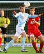 31 August 2006; Kevin Kelbie, Ballymena United, in action against John Convery, Portadown. CIS Insurance Cup, Ballymena United v Portadown, Ballymena Showgrounds, Ballymena, Co. Antrim. Picture credit: Oliver McVeigh / SPORTSFILE
