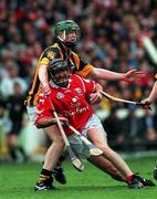 12 September 1999; Brian Corcoran of Cork is tackled by Peter Barry of Kilkenny during the Guinness All-Ireland Senior Hurling Championship Final between Cork and Kilkenny at Croke Park in Dublin. Photo by Brendan Moran/Sportsfile