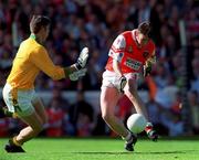29  August 1999; Armagh's Kieran Hughes shots to score his side's second goal past Meath goalkeeper Cormac Sullivan during the Bank of Ireland All-Ireland Senior Football Championship Semi-Final match between Meath and Armagh at Croke Park in Dublin. Photo by Brendan Moran/Sportsfile