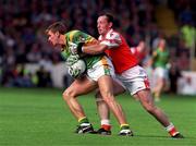 29 August 1999; Darren Fay of Meath in action against John Donaldson of Armagh during the Bank of Ireland All-Ireland Senior Football Championship Semi-Final match between Meath and Armagh at Croke Park in Dublin. Photo by Brendan Moran/Sportsfile