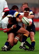 13 August 1999; Dion O'Cuinneagain of Ulster is tackled by Brian O'Driscoll of Leinster during the Guinness Interprovincial Championship match between Leinster and Ulster at Donnybrook Stadium in Dublin. Photo by Brendan Moran/Sportsfile