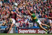 3 August 2014; Aidan O'Mahony, Kerry, attempts to block down a shot by Damien Comer, Galway. GAA Football All-Ireland Senior Championship, Quarter-Final, Kerry v Galway, Croke Park, Dublin. Picture credit: Brendan Moran / SPORTSFILE