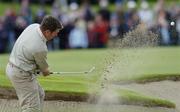 22 September 2006; Lee Westwood, Team Europe 2006, chips out of a bunker at the 18th green during Friday morning's four-ball matches. 36th Ryder Cup Matches, K Club, Straffan, Co. Kildare, Ireland. Picture credit: Brendan Moran / SPORTSFILE