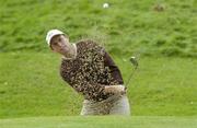 22 September 2006; David Howell, Team Europe 2006, chips from the bunker on the seventh green during Friday afternoon's foursomes matches. 36th Ryder Cup Matches, K Club, Straffan, Co. Kildare, Ireland. Picture credit: Damien Eagers / SPORTSFILE