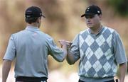 22 September 2006; Zach Johnson, Team USA 2006, is congratulated by playing partner Chad Campbell, right, after his birdie putt on the 17th during Friday afternoon's foursomes matches. 36th Ryder Cup Matches, K Club, Straffan, Co. Kildare, Ireland. Picture credit: David Maher / SPORTSFILE