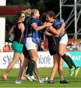 5 August 2014; Ireland players Sharon Lynch, second from left, and Larissa Muldoon celebrate after victory over New Zealand. 2014 Women's Rugby World Cup Final, Pool B, Ireland v New Zealand, Marcoussis, Paris, France. Picture credit: Aurélien Meunier / SPORTSFILE