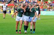 5 August 2014; Ireland players, from left, Ashleigh Baxter, Ailis Egan and Vicky McGinn celebrate victory over New Zealand. 2014 Women's Rugby World Cup Final, Pool B, Ireland v New Zealand, Marcoussis, Paris, France. Picture credit: Aurélien Meunier / SPORTSFILE