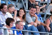 5 August 2014; Ireland and Racing Metro out-half Jonathan Sexton and his wife Laura, son Luca, share a joke with Ireland head coach Joe Schmidt, second from left, at the game. 2014 Women's Rugby World Cup Fina, Pool B, Ireland v New Zealand, Marcoussis, Paris, France. Picture credit: Aurélien Meunier / SPORTSFILE