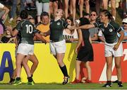 5 August 2014; Ireland players Ashleigh Baxter, Nora Stapleton, Niamh Briggs and Tania Rosser celebrate victory over New Zealand. 2014 Women's Rugby World Cup Final, Pool B, Ireland v New Zealand, Marcoussis, Paris, France. Picture credit: Aurélien Meunier / SPORTSFILE