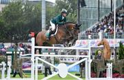 8 August 2014; Darragh Kenny, Ireland, competing on Imothep, during the Aga Khan Nations Cup. Fáilte Ireland Dublin Horse Show 2014, RDS, Ballsbridge, Dublin. Picture credit: Ramsey Cardy / SPORTSFILE