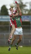 8 October 2006; Karol Mannion, St Bridgets, in action against Tom Ryan, St Faithleachs. Roscommon Senior Football Championship Final, St Bridgets v St Faithleachs, Hyde Park, Roscommon. Picture credit: Damien Eagers / SPORTSFILE