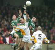 8 October 2006; Stephen Melia, St. Joseph's, in action against Ray Finnegan, left, and Paddy Keenan, St. Patrick's. Louth Senior Football Championship Final, St. Patrick's v St. Joseph's, Clanna Gael Ground, Dundalk. Picture credit: Matt Browne / SPORTSFILE