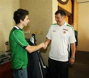 10 October 2006; Northern Ireland manager Lawrie Sanchez greets the fan Stephen Costello, Belfast, who caught his coat after Lawrie threw it into the crowd after the victory over Spain, during a press conference ahead of their Euro 2008 Championship Qualifier against Latvia. Hilton Hotel, Templepatrick, Co. Antrim. Picture credit: Oliver McVeigh / SPORTSFILE