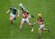 10 August 2014; Eoin Larkin, left, and Colin Fennelly, Kilkenny, in action against Declan Hannon, left, and Tom Condon, Limerick. GAA Hurling All-Ireland Senior Championship, Semi-Final, Kilkenny v Limerick, Croke Park, Dublin. Picture credit: Dáire Brennan / SPORTSFILE