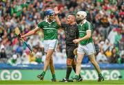 10 August 2014; Referee James McGrath awards Kilkenny a free despite the appeals of Limerick's Gavin O'Mahony, left, and Tom Condon. GAA Hurling All-Ireland Senior Championship, Semi-Final, Kilkenny v Limerick, Croke Park, Dublin. Picture credit: Ramsey Cardy / SPORTSFILE