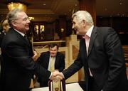 9 October 2006; The new Wicklow manager Mick O'Dwyer is congratulated on his appointment by the Labour party leader Pat Rabitte, T.D., who was on his way to a press conference in the same hotel, prior the Wicklow GAA County Board and Ballymore Properties press conference to introduce the new sponsor and manager. Westbury Hotel, Dublin. Picture credit: Ray McManus / SPORTSFILE