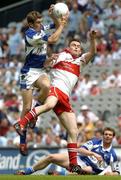 6 August 2005; Colm Begley, Laois, contests a high ball with Derry's Eoin Bradley. Bank of Ireland All-Ireland Senior Football Championship Qualifier, Round 4, Laois v Derry, Croke Park, Dublin. Picture credit; Damien Eagers / SPORTSFILE