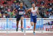 14 August 2014; Dimitri Bascou of France, left, and Andy Turner of Great Britian cross the finish line during their men's 110m hurdles semi-final. European Athletics Championships 2014 - Day 3. Letzigrund Stadium, Zurich, Switzerland. Picture credit: Stephen McCarthy / SPORTSFILE