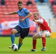 15 August 2014; Tom O'Halloran, UCD, in action against Conor McCormack, St Patrick's Athletic. SSE Airtricity League Premier Division, St Patrick's Athletic v UCD, Richmond Park, Dublin. Picture credit: David Maher / SPORTSFILE