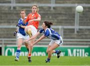 16 August 2014; Fionnuala McKenna, Armagh, in action against Clodagh Dunne, Laois. TG4 All-Ireland Ladies Football Senior Championship, Quarter-Final, Armagh v Laois, O'Connor Park, Tullamore, Co. Offaly. Picture credit: Piaras O Midheach / SPORTSFILE
