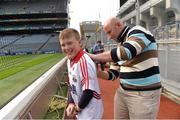 16 August 2014; Brian Corcoran, is the latest to feature on the Bord Gáis Energy Legends Tour Series 2014 when he gave a unique tour of the Croke Park stadium and facilities this week. Other greats of the game still to feature this summer on the Bord Gáis Energy Legends Tour Series include DJ Carey, Brendan Cummins, Maurice Fitzgerald and Mickey Whelan. Full details and dates for the Bord Gáis Energy Legends Tour Series 2014 are available on www.crokepark.ie/events. Pictured are Brian Corcoran with eleven year old Joseph Enright, from Inniscarra, Co. Cork. Croke Park, Dublin. Photo by Sportsfile