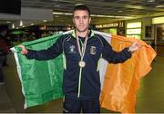 17 August 2014; Ireland's gold medal winner David Oliver Joyce arrives back in Dublin Airport from the 8th European Union Elite Championships in Sofia, Bulgaria. Dublin Airport, Dublin. Picture credit: Matt Browne / SPORTSFILE