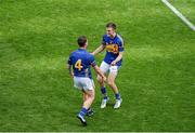 17 August 2014; Tipperary players, Paddy Stapleton, left, and Shane McGrath, celebrate after the game. GAA Hurling All-Ireland Senior Championship Semi-Final, Cork v Tipperary. Croke Park, Dublin. Picture credit: Dáire Brennan / SPORTSFILE