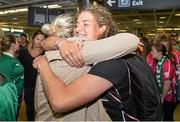 18 August 2014; Ireland's Jenny Murphy is welcomed home by family in Dublin Airport on her return from the Women's Rugby World Cup in France. Dublin Airport, Dublin. Picture credit: Ramsey Cardy / SPORTSFILE
