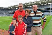 16 August 2014; Brian Corcoran, is the latest to feature on the Bord Gáis Energy Legends Tour Series 2014 when he gave a unique tour of the Croke Park stadium and facilities this week. Other greats of the game still to feature this summer on the Bord Gáis Energy Legends Tour Series include DJ Carey, Brendan Cummins, Maurice Fitzgerald and Mickey Whelan. Full details and dates for the Bord Gáis Energy Legends Tour Series 2014 are available on www.crokepark.ie/events. Pictured are Brian Corcoran with Sean and Ciaran Doolin with their parents Tony and Eillen Doolin from Ballygarvan, Co. Cork. Croke Park, Dublin. Photo by Sportsfile