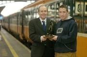 8 November 2006; Philip Hughes, of Dundalk FC, who was presented with the eircom / Soccer Writers Assoc. of Ireland Player of the Month Award for October by Padraig Corkery, Head of Sponsorship, eircom. Heuston Station, Dublin. Picture credit: Brendan Moran / SPORTSFILE