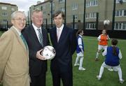 8 November 2006; The Minister for Arts, Sport and Tourism, Mr John O'Donoghue T.D., today announced an allocation of 3 million euro from the Irish Sports Council to the FAI for 2006. At the announcement are Mr John O'Donoghue T.D., centre, Chief Executive of the FAI John Delaney, right, and Chief Executive of the Irish Sports Council John Treacy, with 1st year students from CBS Westland Row. The FAI also announced the appointment of four Development. Recreational Area, Pearse Street, Dublin. Picture credit: Brian Lawless / SPORTSFILE