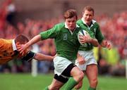 10 October 1999; Brian O'Driscoll of Ireland in action against Ben Tune of Australia during the Rugby World Cup Pool E match between Ireland and Australia at Lansdowne Road in Dublin. Photo by Brendan Moran/Sportsfile