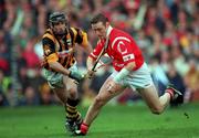 12 September 1999; Fergal Ryan, Cork, in action against DJ Carey, Kilkenny. All Ireland Senior Hurling Championship Final, Croke Park, Dublin. Picture credit; Ray McManus/SPORTSFILE