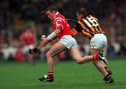 12 September 1999; Fergal Ryan, Cork, in action against Charlie Carter, Kilkenny. All Ireland Senior Hurling Championship Final, Croke Park, Dublin. Picture credit; Brendan Moran/SPORTSFILE