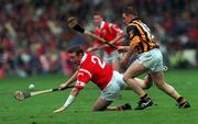 12 September 1999; Fergal Ryan, Cork, in action against Charlie Carter, Kilkenny. All Ireland Senior Hurling Championship Final, Croke Park, Dublin. Picture credit; Brendan Moran/SPORTSFILE