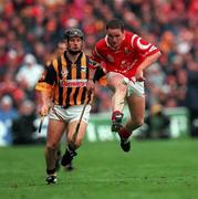 12 September 1999; Michael O'Connell, Cork, in action against P.J Delaney, Kilkenny, All Ireland Senior Hurling Championship Final, Croke Park, Dublin. Picture credit; Ray McManus/SPORTSFILE