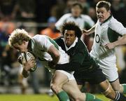 11 November 2006; Andrew Trimble, Ireland, goes over to score his side's first try despite the challange of  South Africa's Bevin Fortuin. Autumn Internationals, Ireland v South Africa, Lansdowne Road, Dublin. Picture credit: David Maher / SPORTSFILE