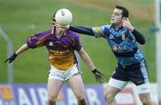 12 November 2006; Shane Lennon, UCD, in action against Richie Brady, Wolfe Tones. AIB Leinster Senior Club Football Championship, Quarter-Final, Wolfe Tones v UCD, Pairc Tailteann, Navan, Co. Meath. Picture credit: Brian Lawless / SPORTSFILE