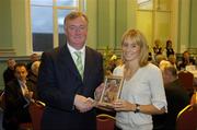 9 November 2006; The Minister for Arts, Sport and Tourism, Mr John O'Donoghue, T.D., with 100-meater hurdler Derval O'Rourke from Co. Cork. at a presentation by the Irish Sports Council to honour Ireland's outstanding sports performers. Kildare Street, Dubllin. Picture credit: Matt Browne / SPORTSFILE