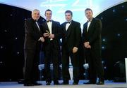 10 November 2006; Keith Higgins, Mayo, receives an award on behalf of Ciaran MacDonald, from An Taoiseach Bertie Ahern, TD, in the company of Dessie Farrell, Chief Executive, GPA and Dave Sheerin, Opel Ireland, at the 2006 Opel GPA Player of the Year Awards. Gaelic Player Assoication Awards, Citywest Hotel, Dublin. Picture credit: Brendan Moran / SPORTSFILE